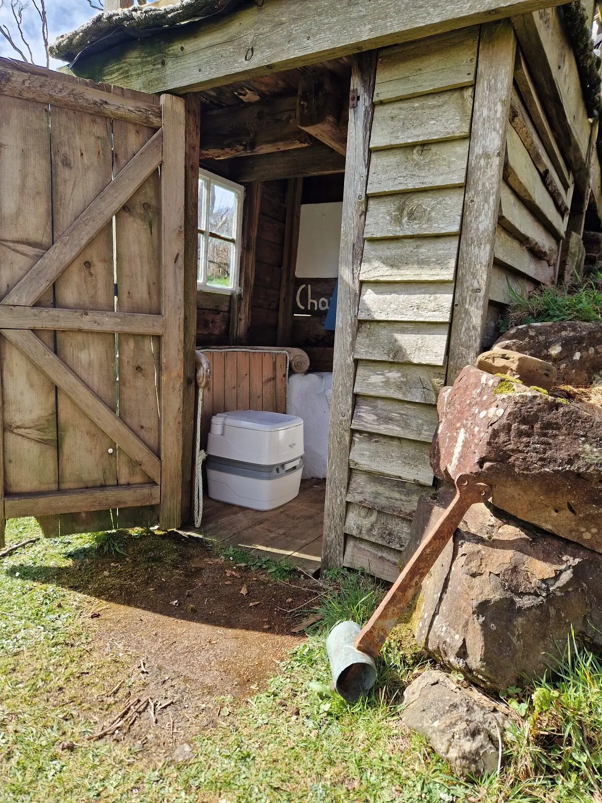 The outside eco-toilet in its own timber outhouse beside the hut